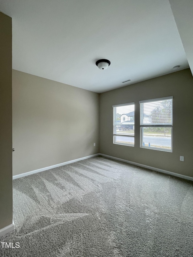 413 Diversity Way, Raleigh, NC 27610 - carpeted empty room with baseboards