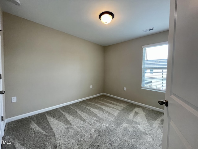 413 Diversity Way, Raleigh, NC 27610 - carpeted empty room featuring baseboards