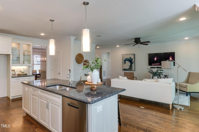 721 Shelley Rd, Raleigh, NC 27609 - kitchen featuring a kitchen island with sink, a sink, open floor plan, a ceiling fan, and ornamental molding