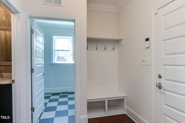 721 Shelley Rd, Raleigh, NC 27609 - mudroom featuring baseboards, ornamental molding, visible vents, and dark floors