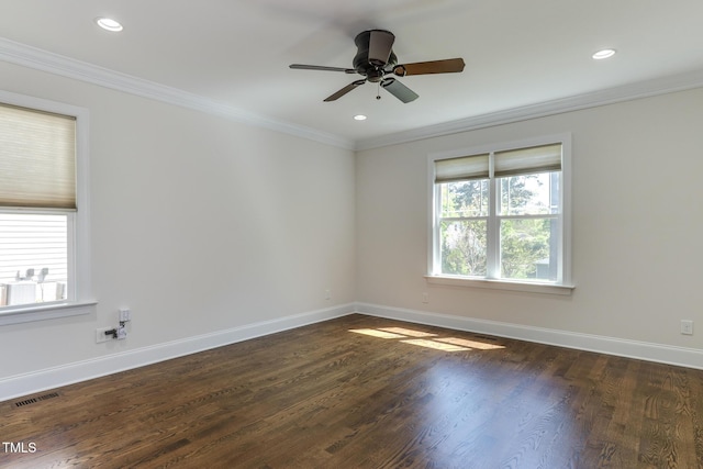 721 Shelley Rd, Raleigh, NC 27609 - spare room with baseboards, visible vents, ornamental molding, and a healthy amount of sunlight