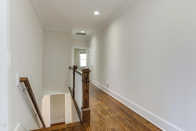 721 Shelley Rd, Raleigh, NC 27609 - corridor with an upstairs landing, ornamental molding, dark wood-style flooring, visible vents, and recessed lighting