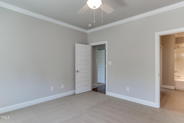 721 Shelley Rd, Raleigh, NC 27609 - unfurnished bedroom featuring ceiling fan, baseboards, crown molding, and carpet flooring