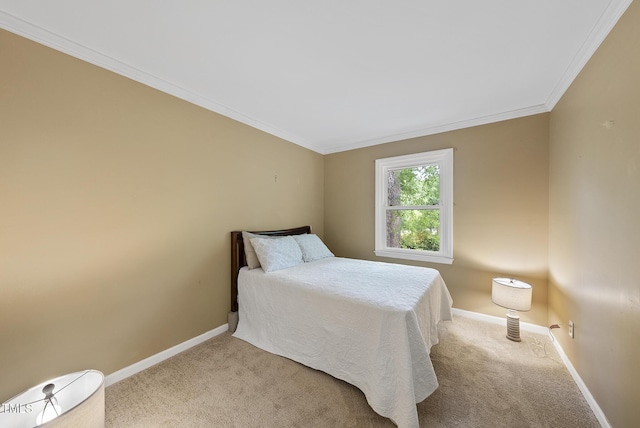 bedroom featuring light carpet, crown molding, and baseboards