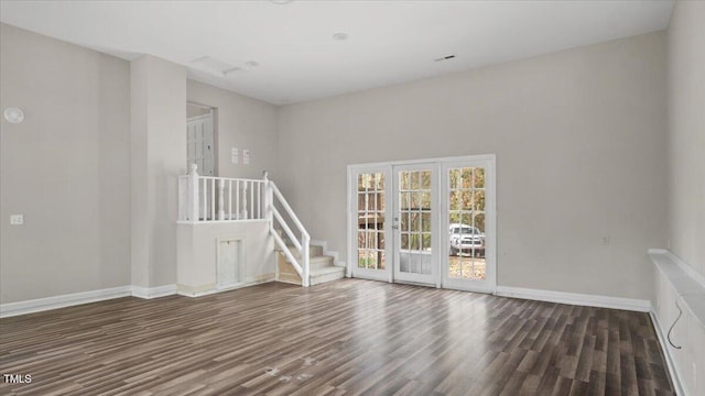 206 Rocky Hills Rd, Pittsboro, NC 27312 - spare room with stairway, baseboards, and wood finished floors