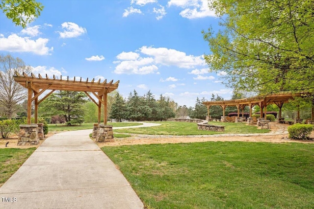 956 The Parks Dr, Pittsboro, NC 27312 - view of home's community featuring a yard and a pergola