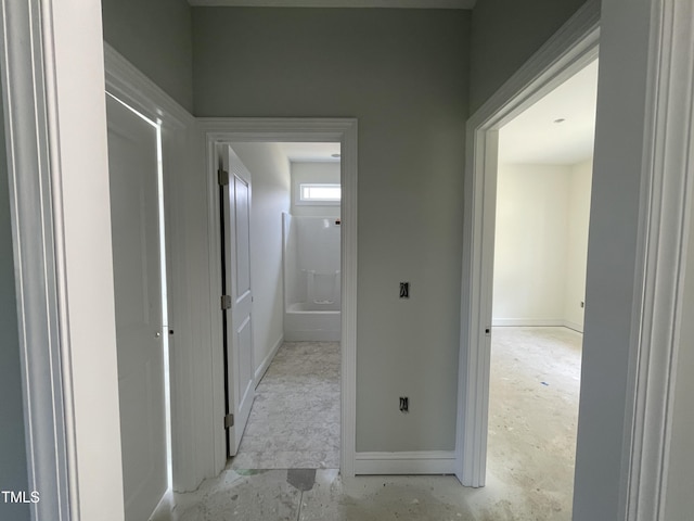 502 S Vance St, Fremont, NC 27830 - hallway with unfinished concrete floors and baseboards