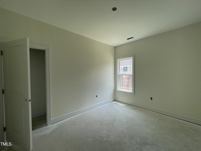 502 S Vance St, Fremont, NC 27830 - unfurnished bedroom with unfinished concrete flooring and baseboards