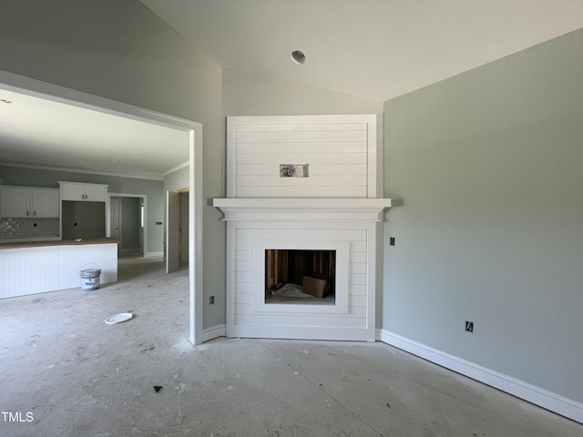 502 S Vance St, Fremont, NC 27830 - unfurnished living room with baseboards, a fireplace, crown molding, and lofted ceiling