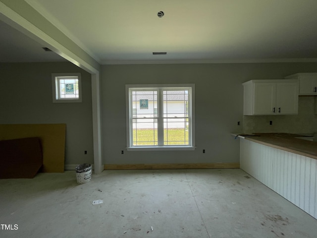 502 S Vance St, Fremont, NC 27830 - unfurnished dining area with ornamental molding