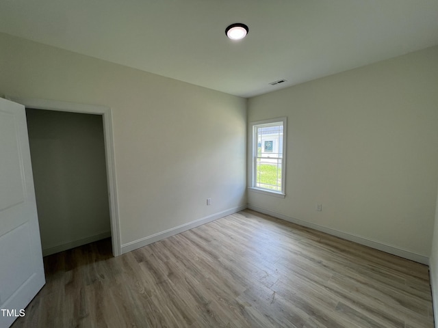 502 S Vance St, Fremont, NC 27830 - unfurnished bedroom with wood finished floors and baseboards
