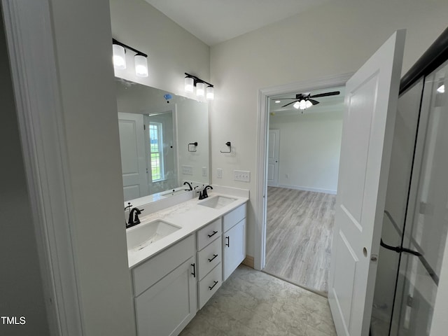 502 S Vance St, Fremont, NC 27830 - full bath with double vanity and a ceiling fan