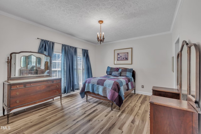 2265 Bud Lipscomb Rd, Willow Springs, NC 27592 - bedroom with light wood-style floors, a textured ceiling, a chandelier, and crown molding