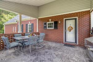 2265 Bud Lipscomb Rd, Willow Springs, NC 27592 - view of patio featuring outdoor dining area