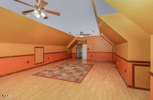 2265 Bud Lipscomb Rd, Willow Springs, NC 27592 - additional living space with lofted ceiling, a ceiling fan, and wood finished floors