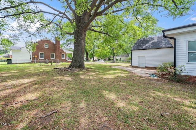 view of yard featuring fence