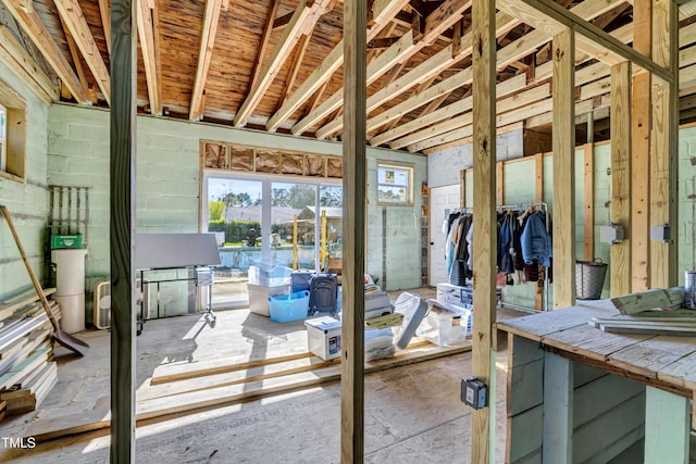 miscellaneous room with concrete block wall