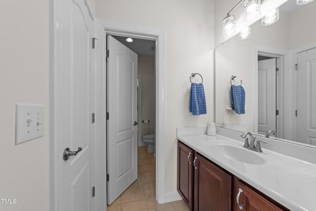 5928 Terrington Ln, Raleigh, NC 27606 - bathroom featuring tile patterned flooring, vanity, and toilet