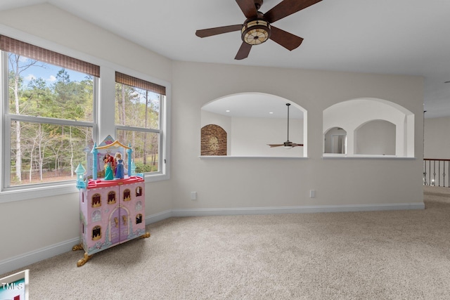 5928 Terrington Ln, Raleigh, NC 27606 - game room with carpet flooring, a ceiling fan, and a healthy amount of sunlight