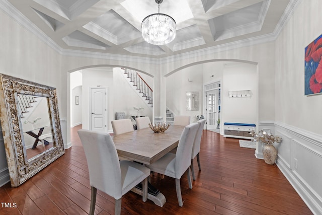 5928 Terrington Ln, Raleigh, NC 27606 - dining room with dark wood-style flooring, a chandelier, stairs, coffered ceiling, and arched walkways