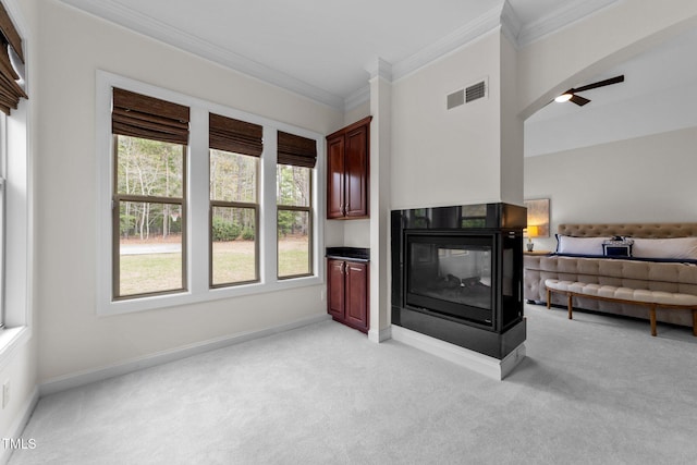 5928 Terrington Ln, Raleigh, NC 27606 - living area with visible vents, baseboards, and ornamental molding
