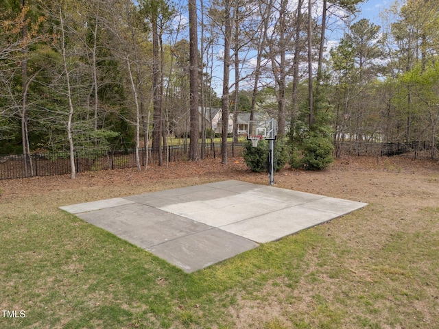 5928 Terrington Ln, Raleigh, NC 27606 - view of basketball court with community basketball court, a yard, and fence