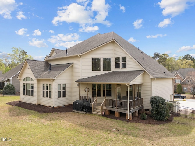 5928 Terrington Ln, Raleigh, NC 27606 - rear view of property featuring a yard, fence, crawl space, and roof with shingles