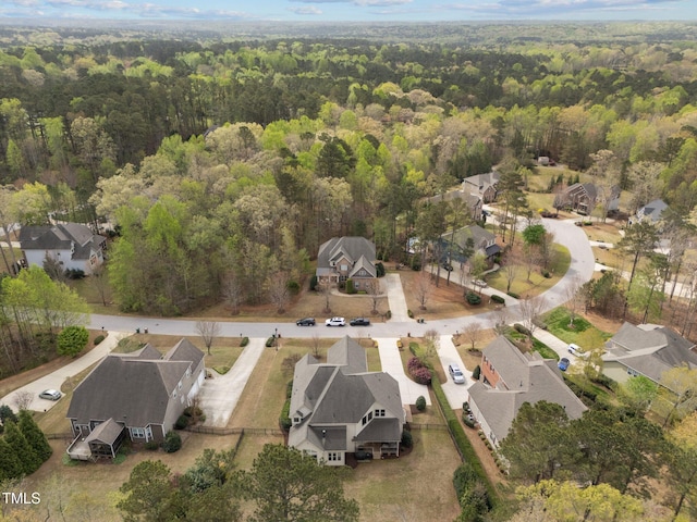 5928 Terrington Ln, Raleigh, NC 27606 - birds eye view of property with a wooded view and a residential view