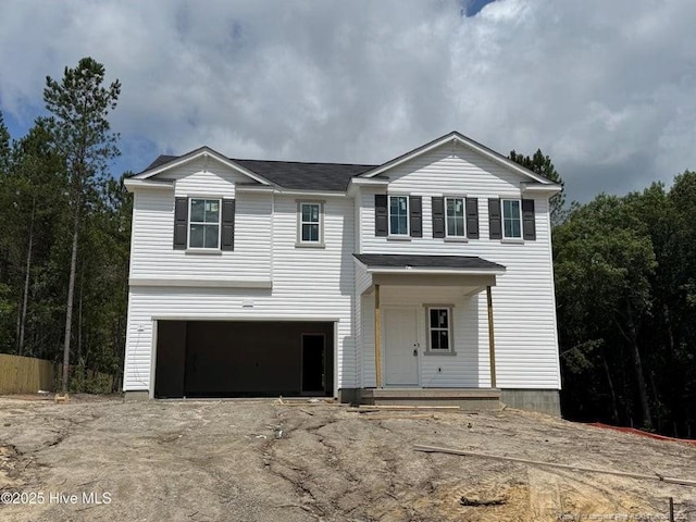 28 Horse Trot Ln, Sanford, NC 27332 - view of front of property with an attached garage, asphalt driveway, and a shingled roof