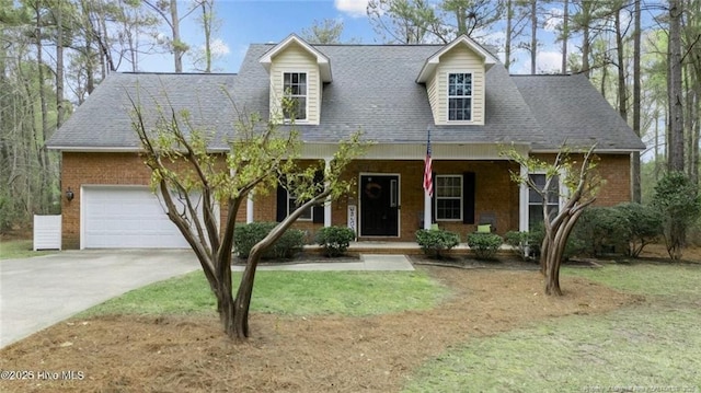 887 Thrush Dr, Vass, NC 28394 - new england style home featuring a garage, covered porch, driveway, and brick siding