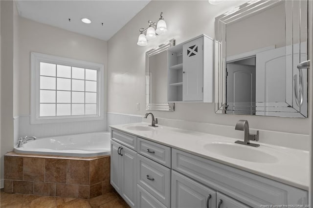 887 Thrush Dr, Vass, NC 28394 - full bathroom featuring double vanity, tile patterned flooring, a sink, and a garden tub