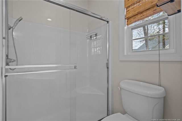 887 Thrush Dr, Vass, NC 28394 - bathroom featuring toilet and a shower stall