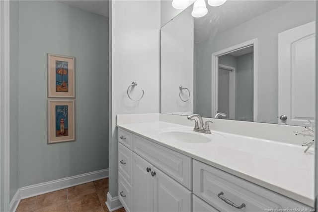 887 Thrush Dr, Vass, NC 28394 - bathroom featuring baseboards and vanity