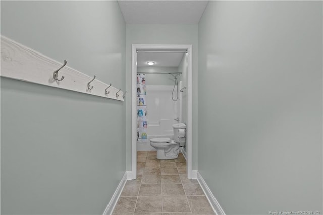 887 Thrush Dr, Vass, NC 28394 - hallway featuring baseboards and light tile patterned floors