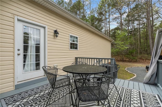 887 Thrush Dr, Vass, NC 28394 - wooden terrace featuring outdoor dining space