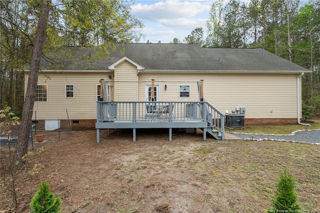 887 Thrush Dr, Vass, NC 28394 - back of property featuring cooling unit, crawl space, and a deck