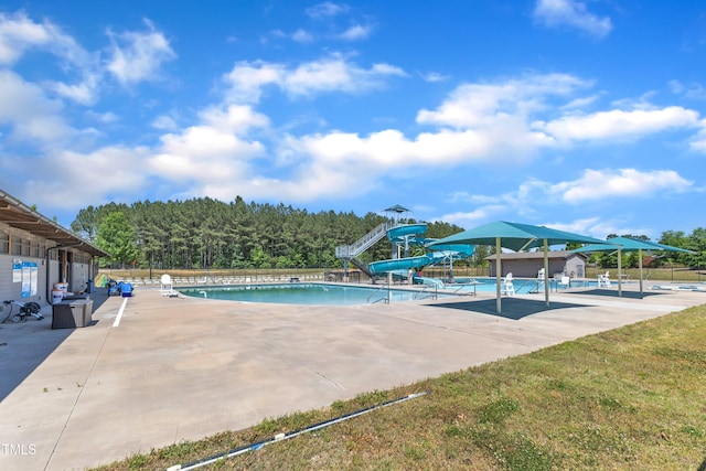 706 Fireball Ct, Knightdale, NC 27545 - community pool with a patio and a water slide