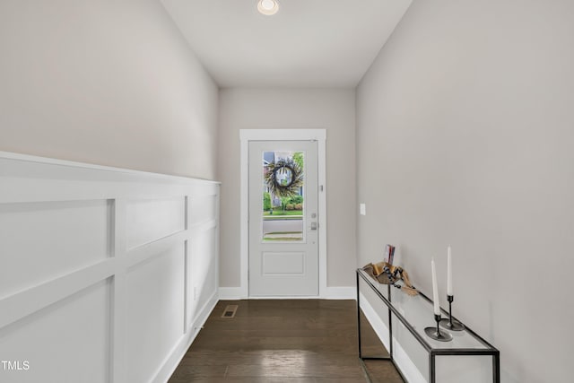 706 Fireball Ct, Knightdale, NC 27545 - entryway featuring dark wood finished floors and baseboards
