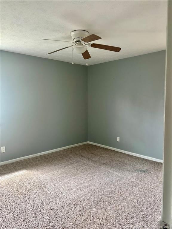 5704 Selkirk Pl, Fayetteville, NC 28304 - carpeted spare room featuring baseboards, a textured ceiling, and ceiling fan