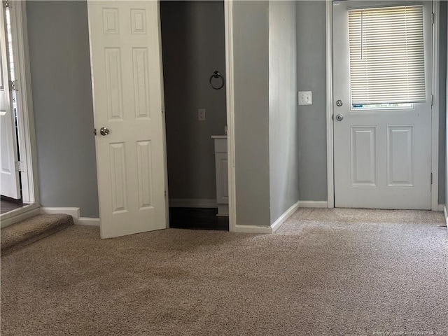5704 Selkirk Pl, Fayetteville, NC 28304 - foyer featuring baseboards and carpet floors