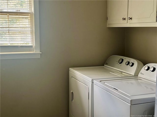 5704 Selkirk Pl, Fayetteville, NC 28304 - laundry area featuring cabinet space and washing machine and dryer