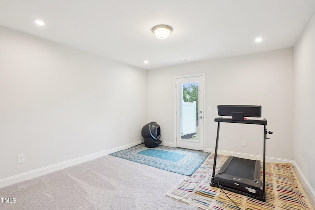 workout area featuring recessed lighting, baseboards, and carpet floors
