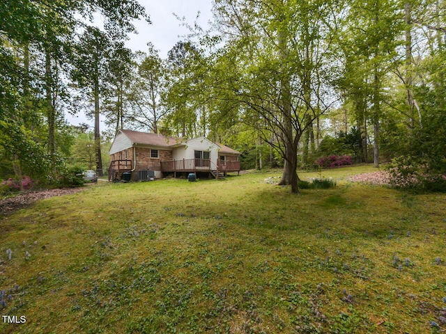 view of yard with a deck