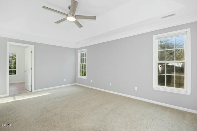 102 Cockleshell Ct, Cary, NC 27513 - unfurnished room featuring light carpet, ceiling fan, visible vents, and plenty of natural light