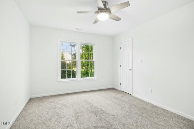 102 Cockleshell Ct, Cary, NC 27513 - carpeted empty room featuring visible vents, baseboards, and a ceiling fan