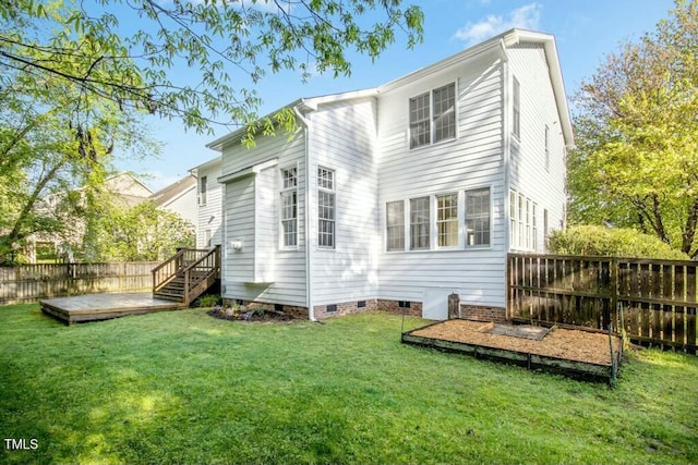 102 Cockleshell Ct, Cary, NC 27513 - back of property with crawl space, a deck, fence private yard, and a lawn
