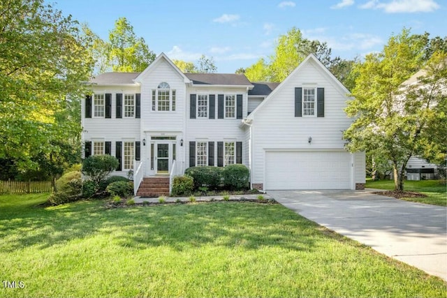 102 Cockleshell Ct, Cary, NC 27513 - colonial inspired home featuring a garage, a front lawn, and concrete driveway