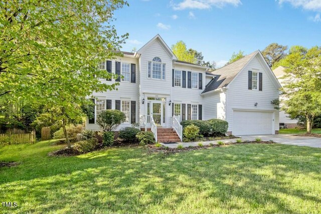 102 Cockleshell Ct, Cary, NC 27513 - colonial-style house with a garage, a front yard, and driveway