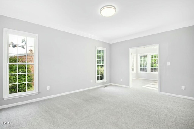 102 Cockleshell Ct, Cary, NC 27513 - carpeted empty room with baseboards and a healthy amount of sunlight