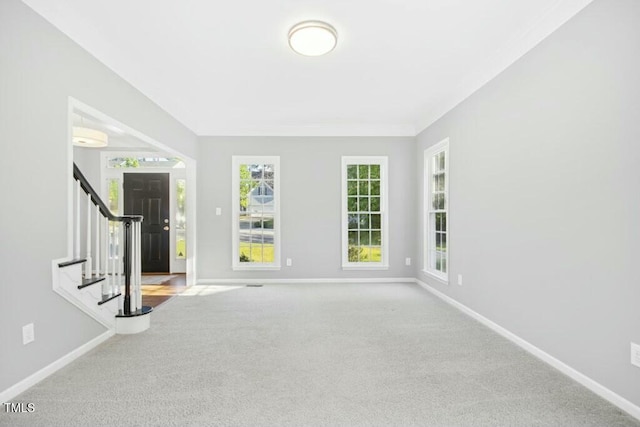 102 Cockleshell Ct, Cary, NC 27513 - interior space with ornamental molding, baseboards, and stairs
